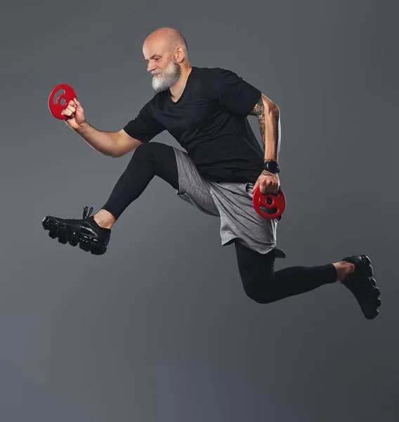 Portrait Carefree Senior Athlete Man Dressed Sportswear Jumping Holding Fitness — Stock Photo, Image
