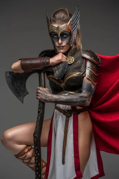 Shot Fantasy Female Warrior Dressed Armor Red Cape Looking Camera — Zdjęcie stockowe