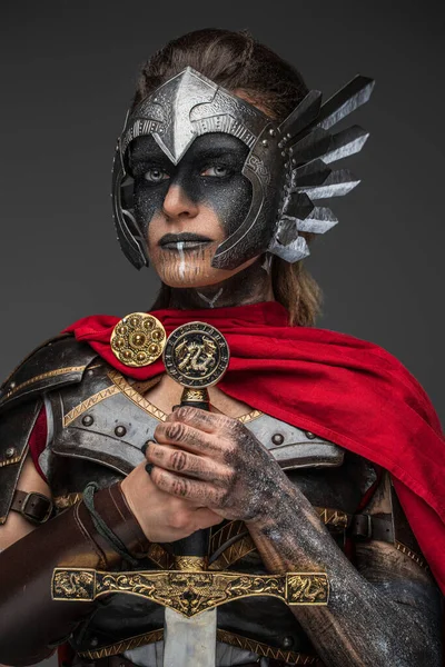 Portrait Ancient Warrior Woman Dressed Red Cape Dark Armor Holding — Fotografia de Stock