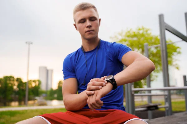 Shot Blond Haired Athlete Dressed Sportswear Setting Timer His Watch — 스톡 사진