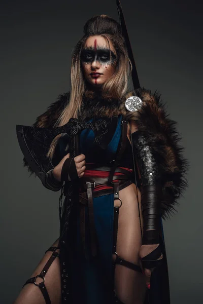 Portrait Female Warrior Dressed Attire Fur Holding Axe Grey Background — Foto Stock