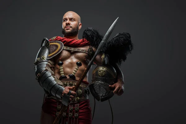 Portrait Isolated Grey Background Gladiator Muscular Build Holding Helmet Spear — Stock Photo, Image