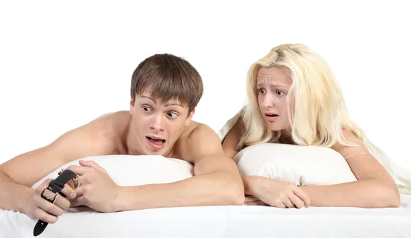 Young couple wakes up looking at the clock — Stock Photo, Image