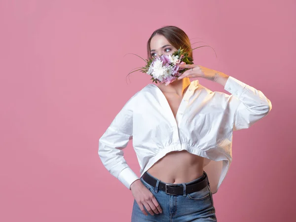 stock image Protective face mask in flowers and petals, spring,