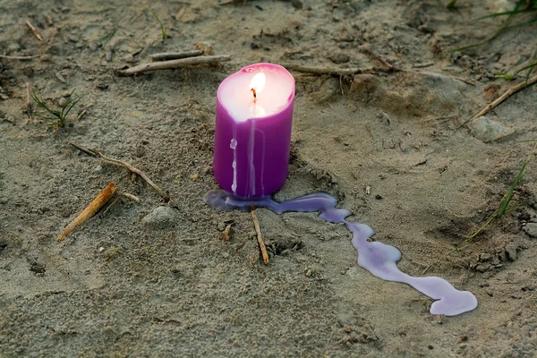 Candle on the ground — Stock Photo, Image