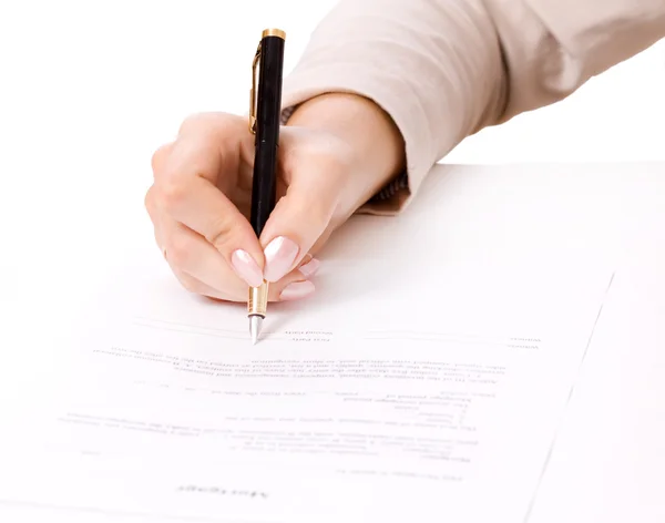 Vrouwelijke hand ondertekening van een contract, hypotheek — Stockfoto