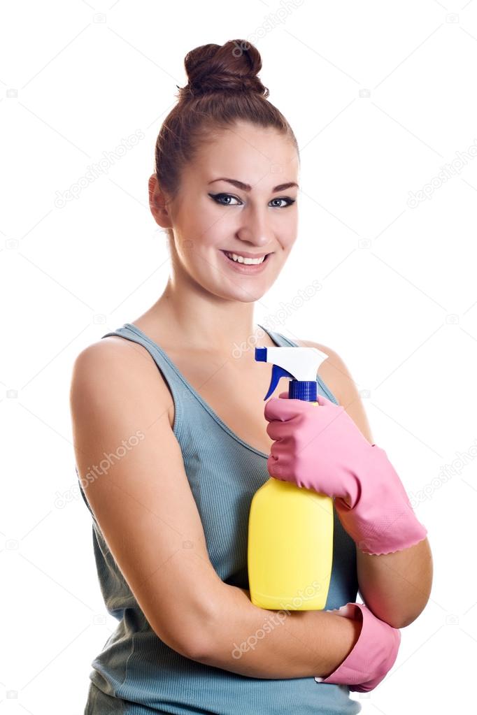 Woman ready for spring cleaning smiling with rubber gloves and c