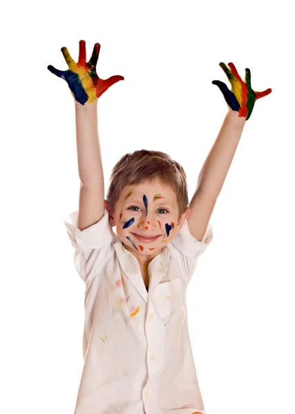 Little boy with hands painted in colorful paints ready for hand — Stock Photo, Image