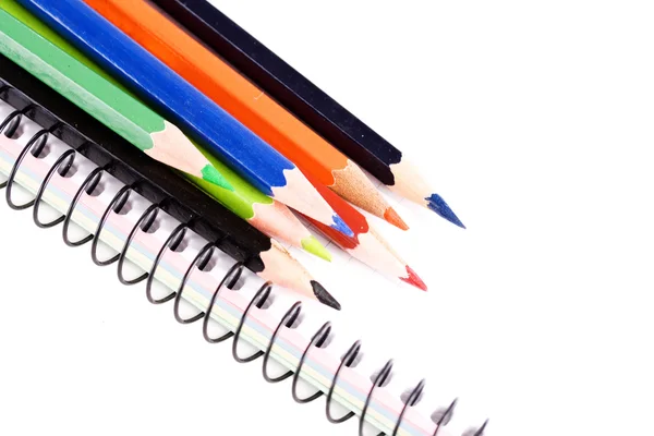 Color pencils on a blank sheet — Stock Photo, Image