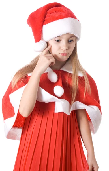 Girl in santa hat thought of the gift — Stock Photo, Image