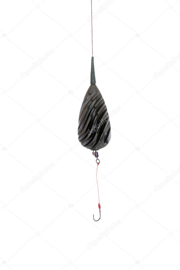 White fish hanging on a fishing line with a hook. Stock Photo by