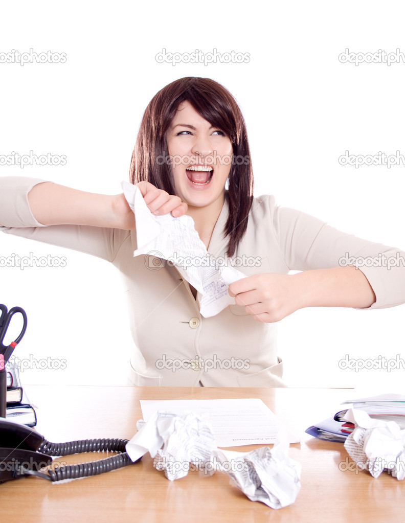Young woman tearing paper