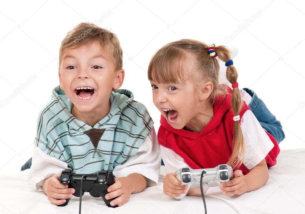 Happy girl and boy playing a video game