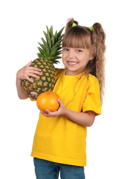 Little girl with pineapple — Stock Photo, Image