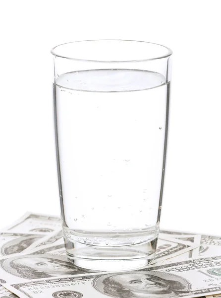 Dollar und ein Glas Wasser — Stockfoto
