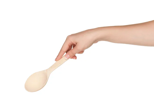 Hand with spoon — Stock Photo, Image