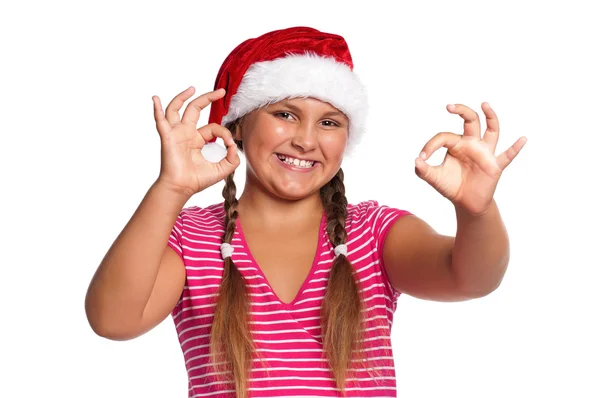 Menina em santa chapéu — Fotografia de Stock