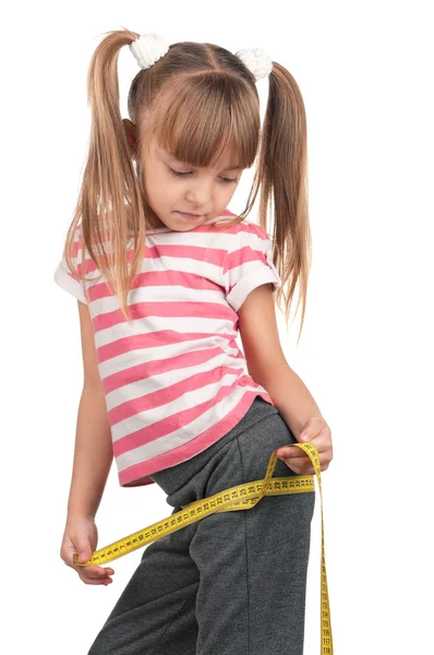 Little girl with measure — Stock Photo, Image