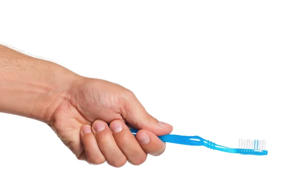 Diş fırçası ile el — Stok fotoğraf