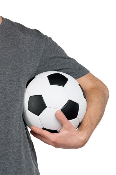 Man standing with classic soccer ball on isolated white background