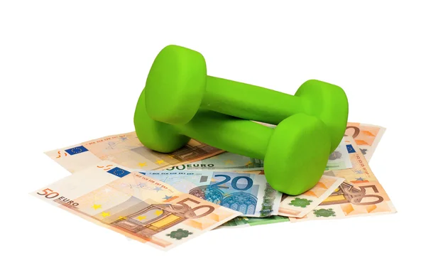 Euro and dumbbells — Stock Photo, Image