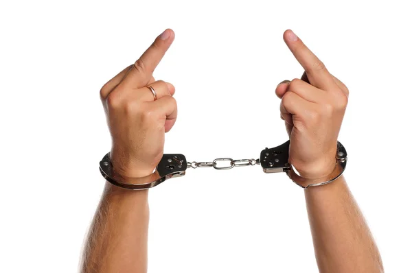 Рука с наручниками — стоковое фото