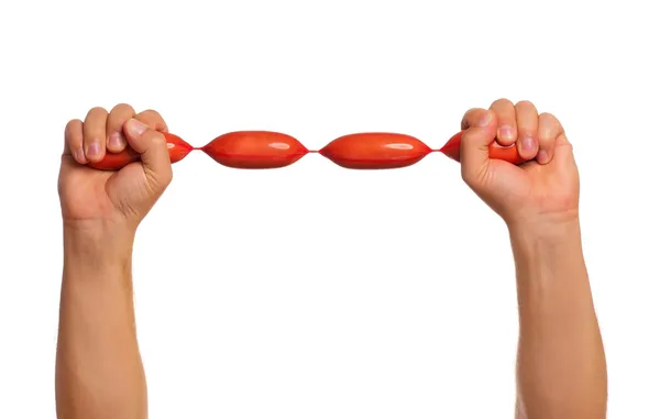 Hand with sausage — Stock Photo, Image