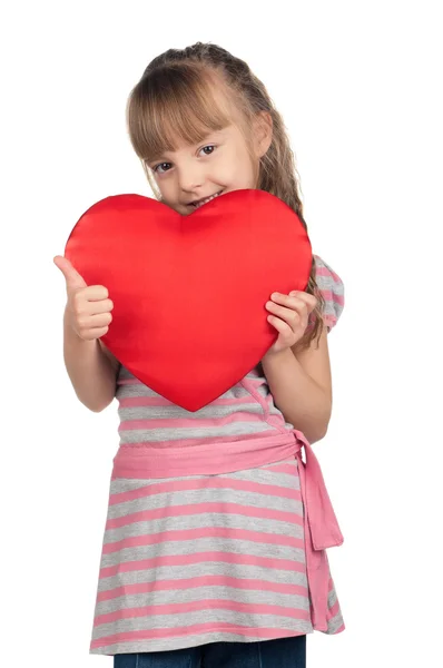 Little girl with red heart — Stock Photo, Image