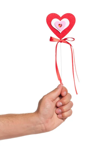 Hand with heart on a stick — Stock Photo, Image