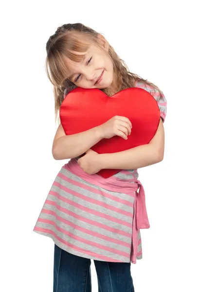 Little girl with red heart — Stock Photo, Image