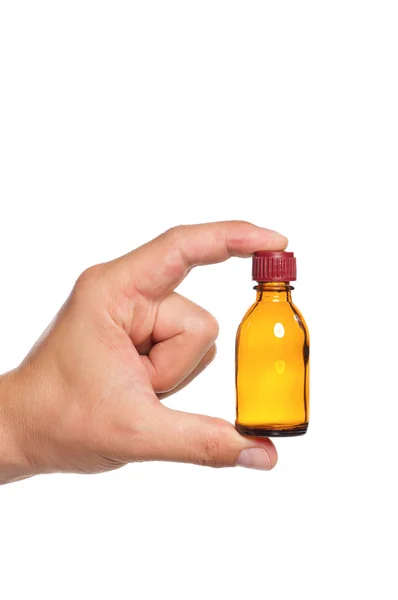 Hand with small bottle — Stock Photo, Image