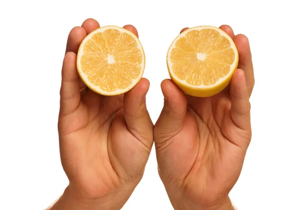 Ruka s citronem — Stock fotografie
