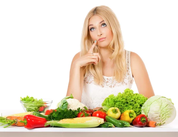 Woman with vegetables Stock Image