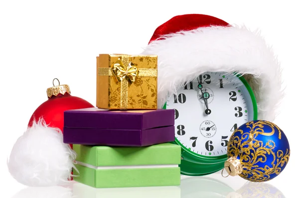 Alarm clock with santa hat — Stock Photo, Image