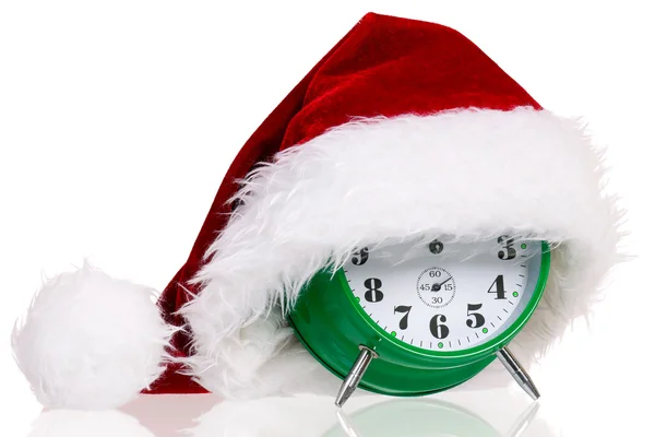 Alarm clock with santa hat — Stock Photo, Image