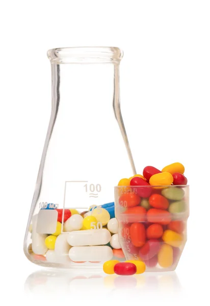 Flask with pills — Stock Photo, Image