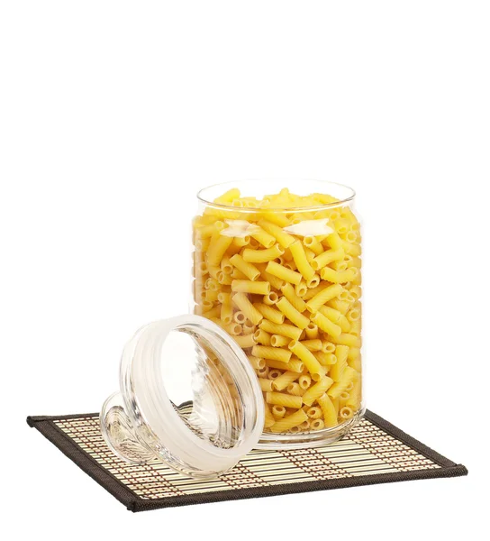 Pasta in glass pot — Stock Photo, Image