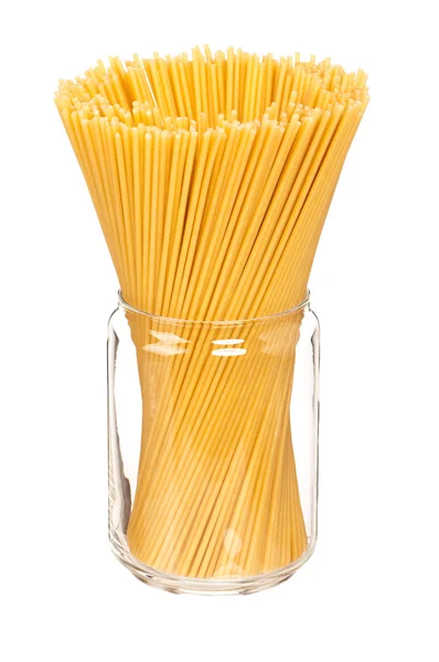 Spaghetti in glass pot — Stock Photo, Image