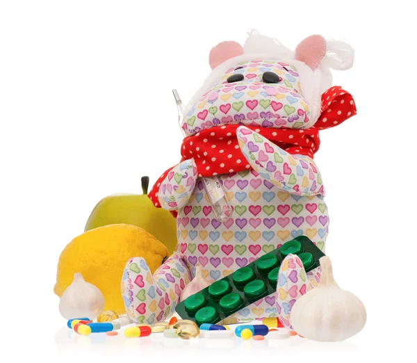 Toy hippopotamus with pills — Stock Photo, Image