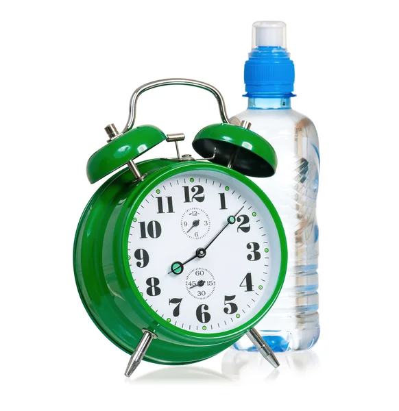 Clock with bottle of water — Stock Photo, Image