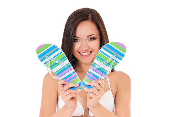 Sexy young brunette woman with slippers — Stock Photo, Image