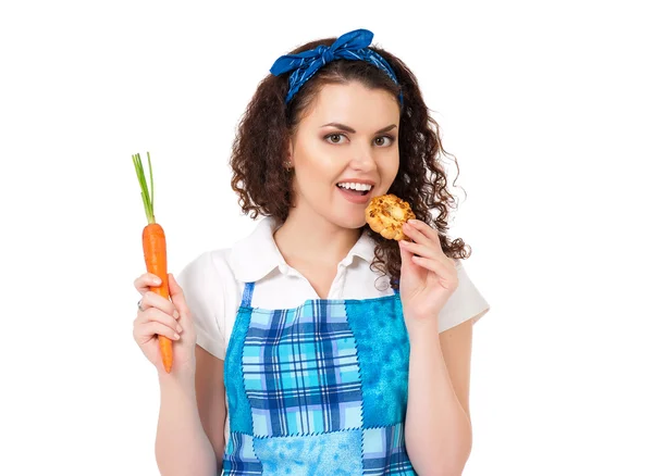 Menina com cenoura e biscoito — Fotografia de Stock