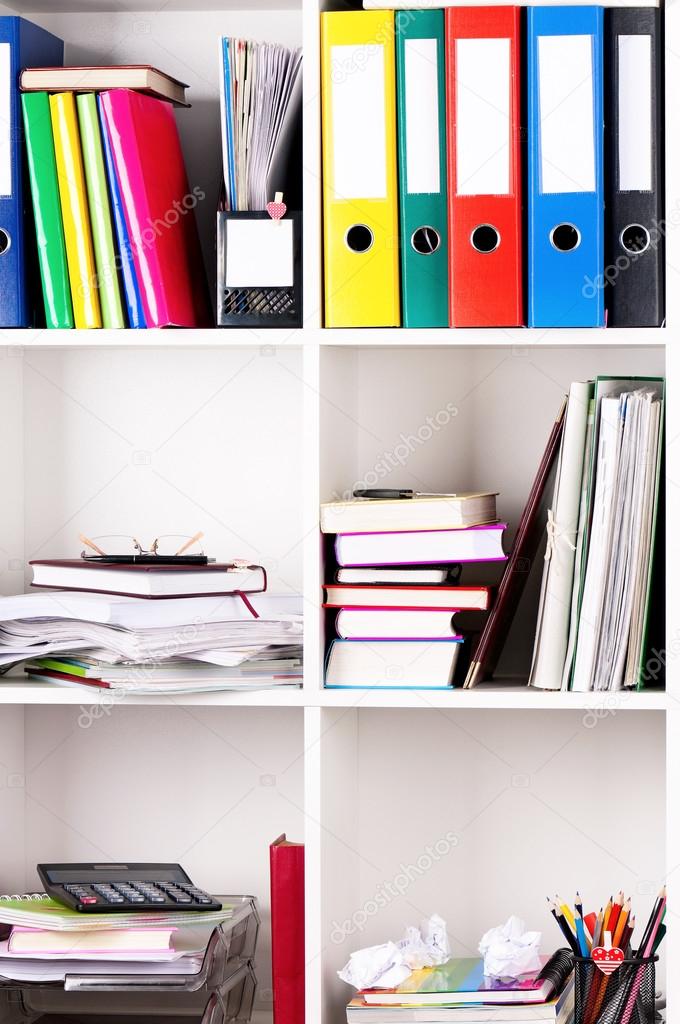 Folders on shelves