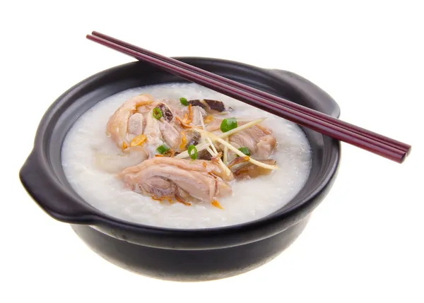 Traditionele chinese PAP rijst pap geserveerd in claypot — Stockfoto