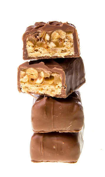 Čokolády s karamelem izolovaných na bílém pozadí — Stock fotografie