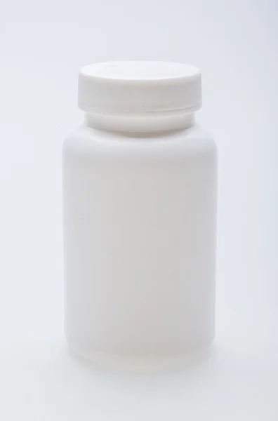 Boş beyaz ilaç şişesi — Stok fotoğraf