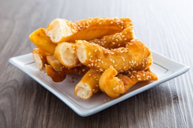 At ayakkabı börek, olarak da bilinen Ma Geok veya kelebek, popüler bir kızarmış yemek Çinliler arasında