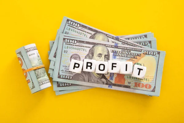 Profit Word Stack Usd Yellow Background — Stockfoto