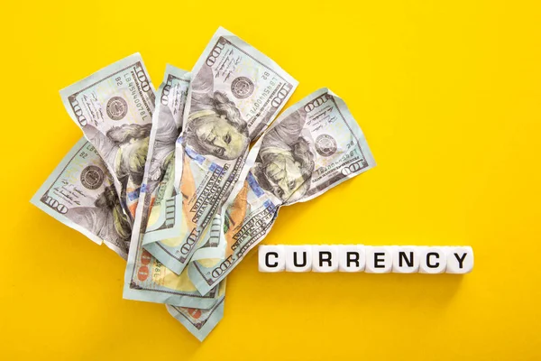 Money Currency Word Yellow Background — Stockfoto