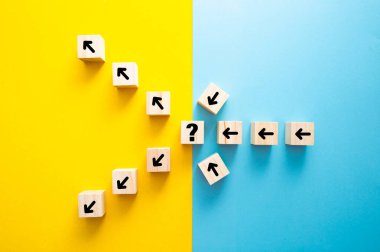 Path lead decision which changes the path in two directions on blue and yellow background.